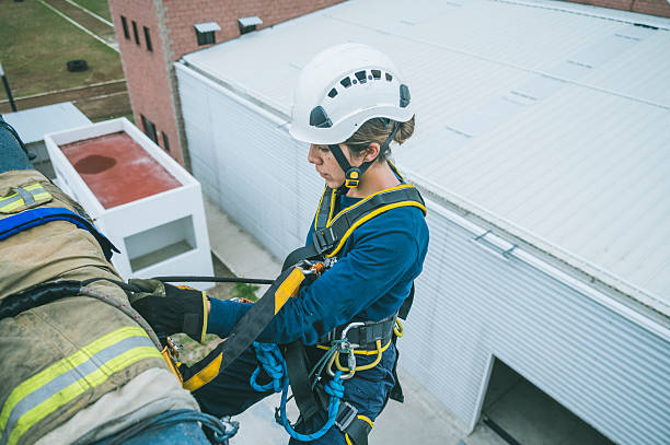 istock Latina firefighter rescuer about to rappel down a building 2245029539