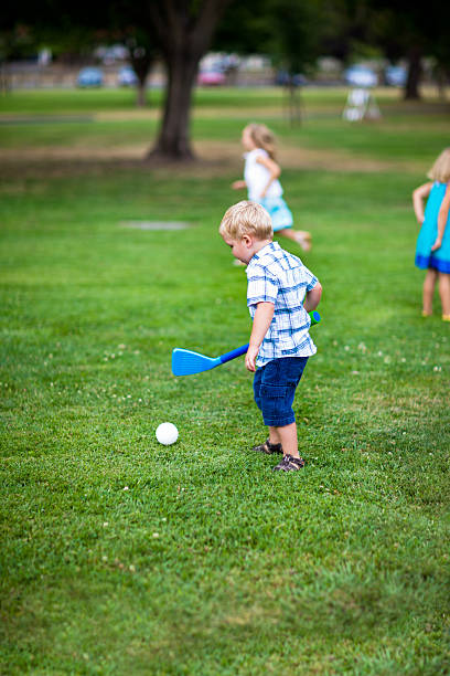istock Young children playing in park 2245031354