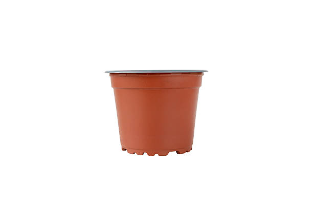 istock Brown plastic flower pot isolated on white background 2245033723