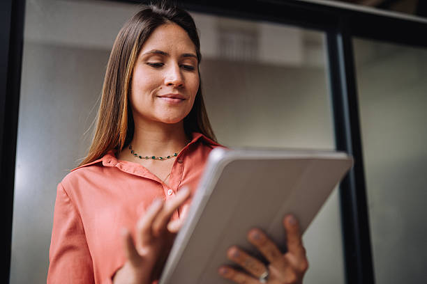 istock Businesswoman working on a digital tablet 2245048727
