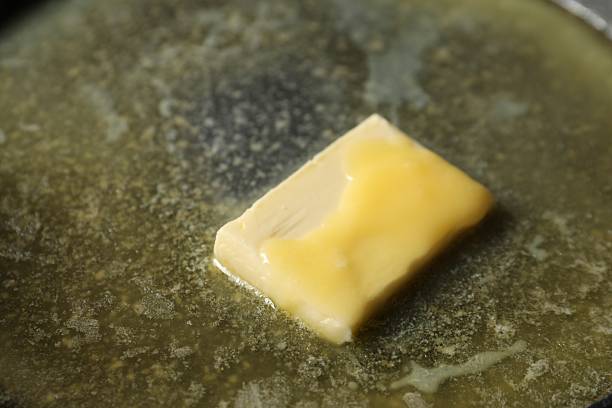 istock Melting butter in frying pan, closeup view 2245050391