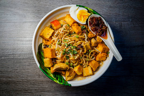 istock Mee Kari or Curry Mee with wooden background with top view. 2245054653