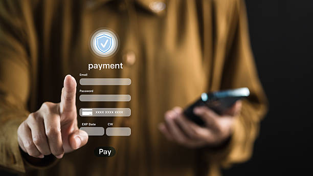 istock Secure Online Payment Form with Finger Tapping Pay on Smartphone 2245055334
