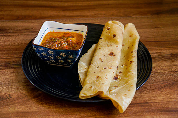 istock Chapati with chicken curry mix with sardine sambal. 2245056436