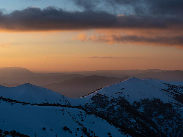 istock Mystical sunset on mountain layers and snow 2245057570