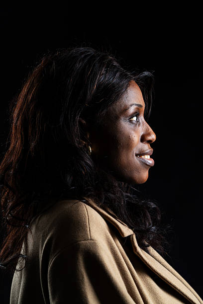 istock African female side-view showing positive emotions 2245060344