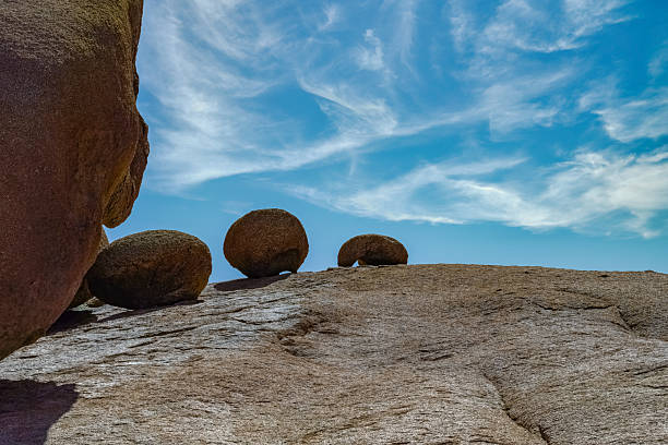 Nha Trang, Vietnam- August 13, 2025: This is Hon Chong Cape in Nha Trang.It's about 15 minutes from the city center.At the tip of the cape, there are rocks of various sizes, and a monolith is sandwiched between them in an exquisite balance, seemingly floating.Legend has it that this rock was brought there by giants who once lived in the sea. It's also a popular date spot for young couples.