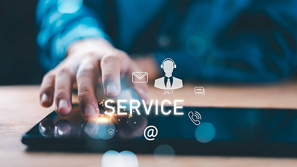 istock Hand touching digital tablet with service icons, customer support 24-7, email, call, and chat communication symbols. Concept for online business service, digital assistance, and client care. 2245064220
