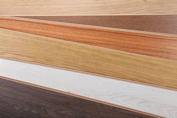 istock Different samples of wooden flooring as background, top view 2245065510