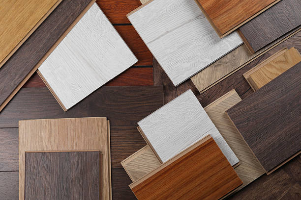 istock Different samples of wooden flooring as background, flat lay 2245065589