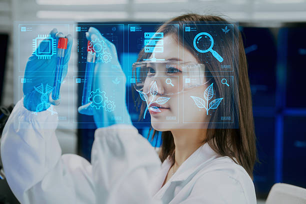 istock An Asian female scientist in a modern lab examines two test tubes while using augmented reality, smart glasses,holographic data overlays, highlighting biotechnology, precision research, innovation 2245066419