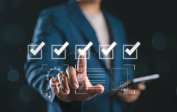 istock Quality assurance concept with Businessman checking virtual checklist. Digital quality control and service guarantee idea for business standards, workflow efficiency, certification 2245070870