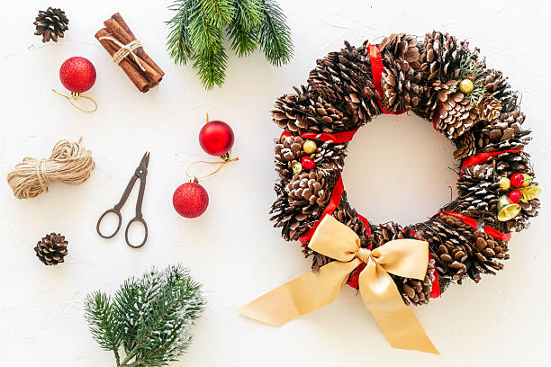 istock Christmas wreath with accessories, top view. New Year DIY decoration 2245087331