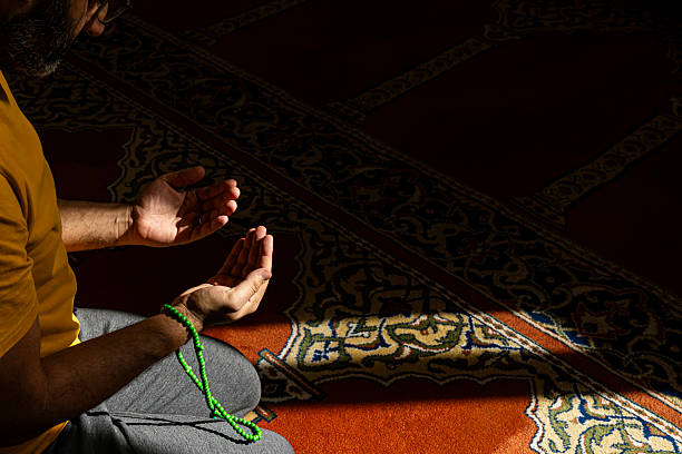 istock close up of Man praying in the mosque 2245090788