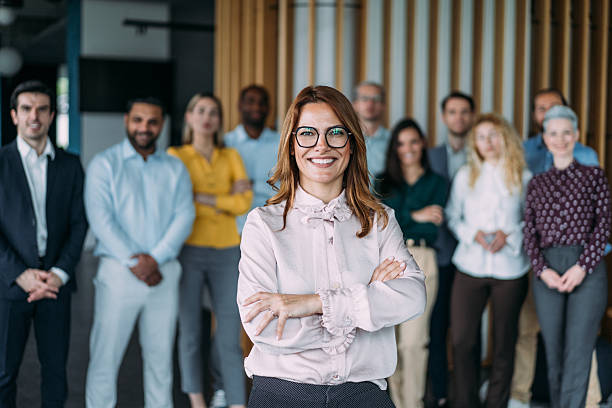 istock Confident businesswoman and her team. 2245094006