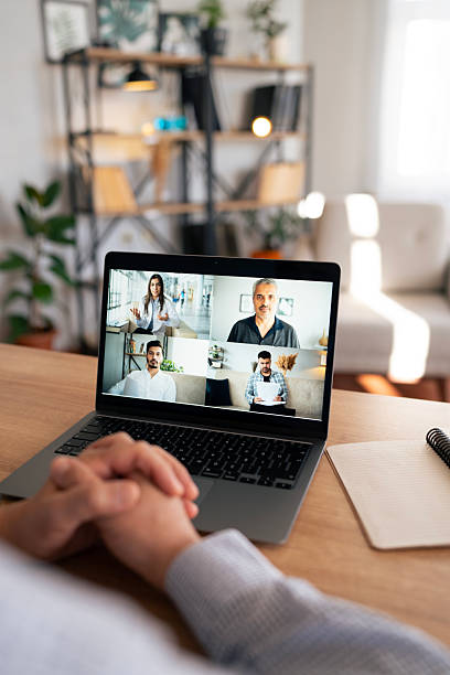 istock Senior man attending group video call from home 2245096184