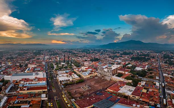 istock Vibrant cityscape with historic cathedral at sunset 2245097377