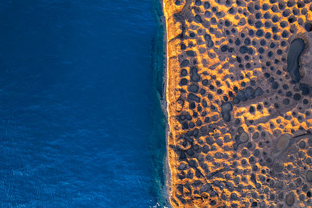istock Pattern on rocky cliff, aerial view, Ventotene, Italy 2245108406