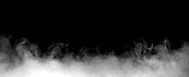 istock Realistic white smoke and fog swirling on a dark black background, perfect for visual effects, cinematic scenes, and mysterious atmosphere design. Ideal for overlays, Halloween, or fantasy artwork. 2245108897