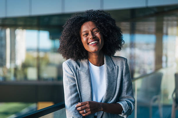 istock Smiling black businesswoman expressing authentic joy and success 2245110587