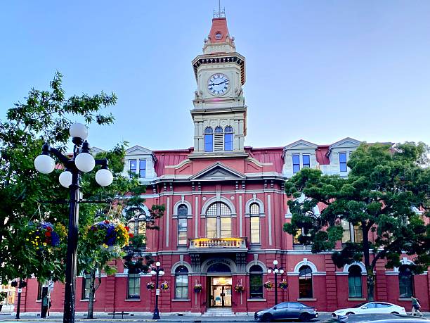 istock Historic red brick building with clock tower in Victoria. 2245110918