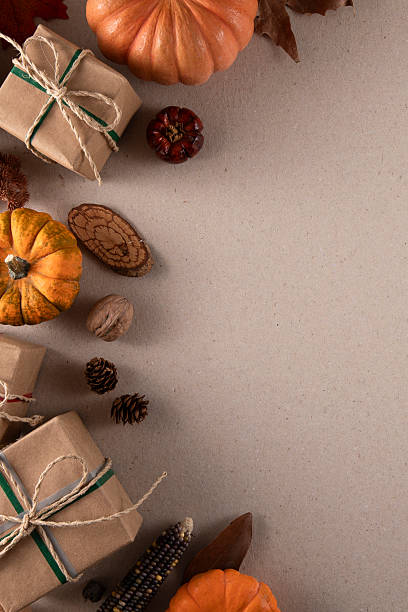 istock Autumn Background with Pumpkins and Gifts 2245111878