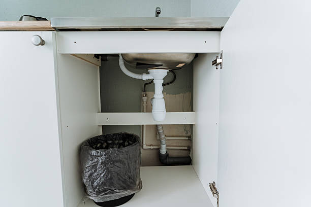 istock Located conveniently beneath the sink inside the cabinet, there is a trash can that serves the purpose of keeping the area organized and promoting cleanliness throughout the space 2245114262