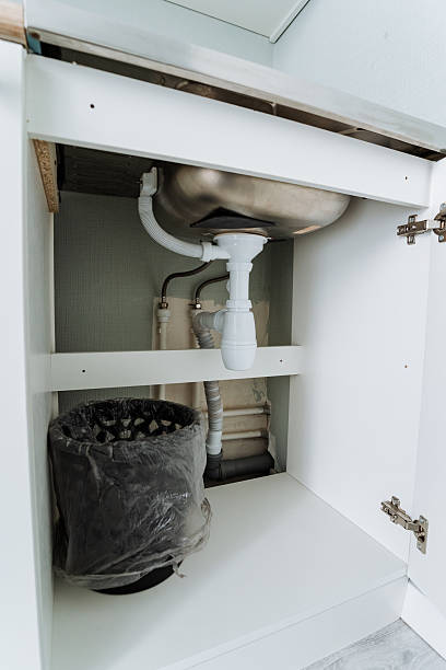 istock If you check under the sink cabinet, you will discover a conveniently placed trash can that allows for easy access and efficient waste disposal whenever you need it, ensuring cleanliness 2245114305