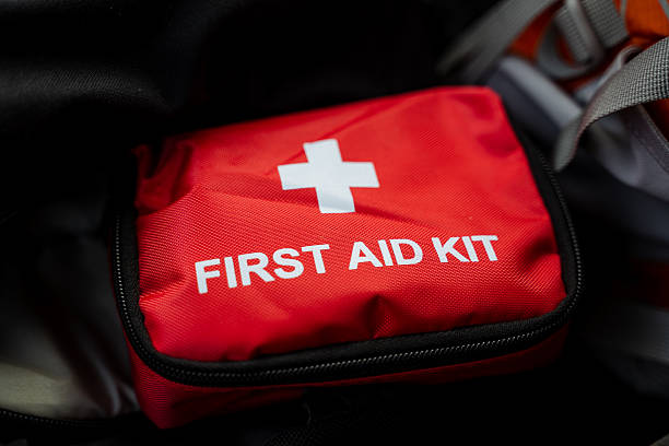 istock A bright red first aid kit adorned with a prominent white cross, signifying its purpose for medical assistance and emergency care, is an essential item for health and safety 2245115795