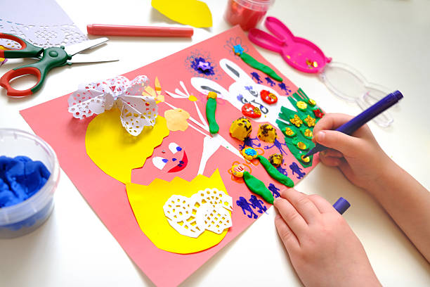 istock DIY Easter home decor from paper and plasticine, Gift ideas, painting Easter card. Handmade.  Childrens Easter crafts 2245119318