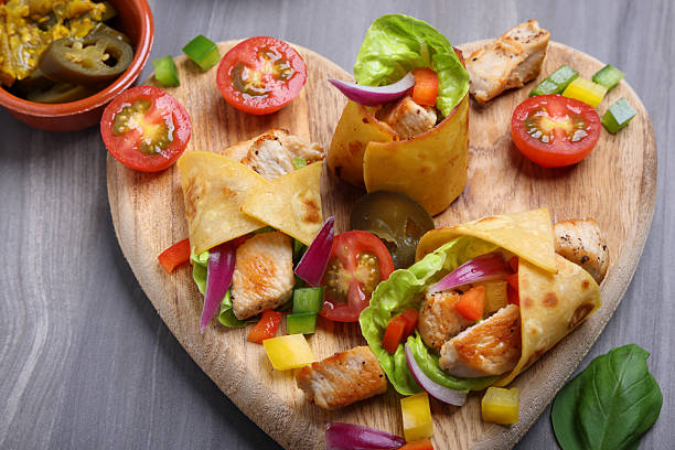 Tortilla Wraps with meat and avocado a Mexican cuisine appetizer
