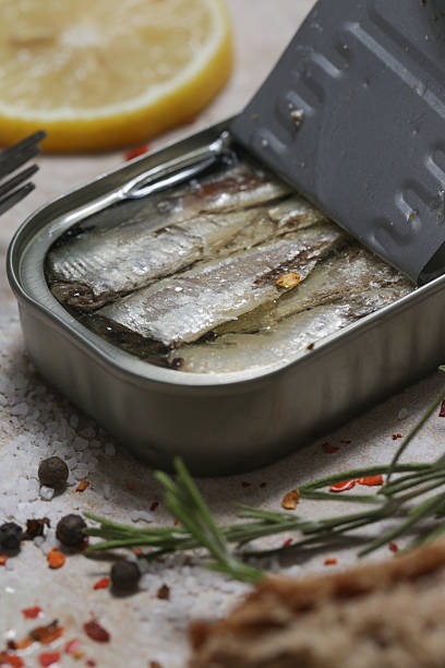 istock Overhead view of open sardine tin, great source of daily protein intake 2245121975
