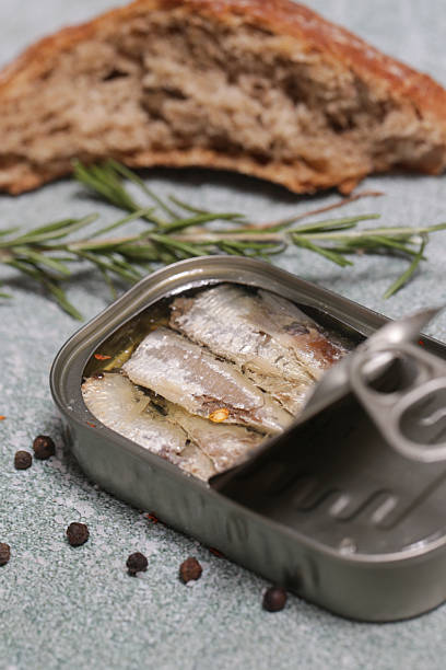 istock Overhead view of open sardine tin, great source of daily protein intake 2245122479
