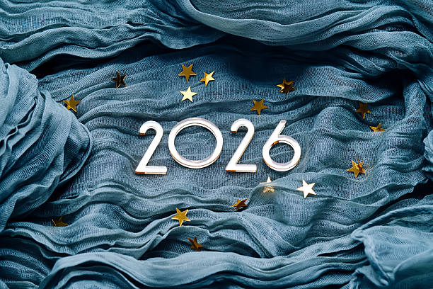 New Year's background with the number 2026 on a blue background.