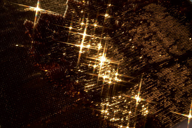 istock Abstract festive gold background made of sequins. 2245123399