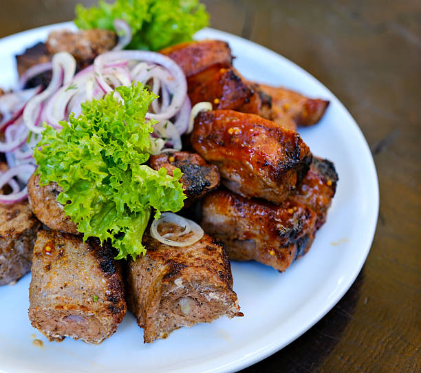 istock Grilled meat platter Mixed meat grill 2245124543