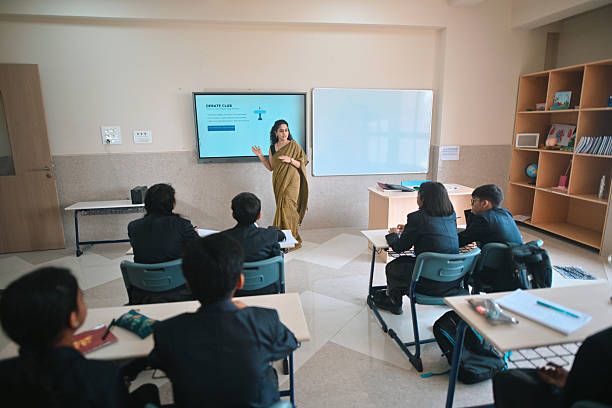 istock Teacher introducing the Debate Club to middle school students 2245126027