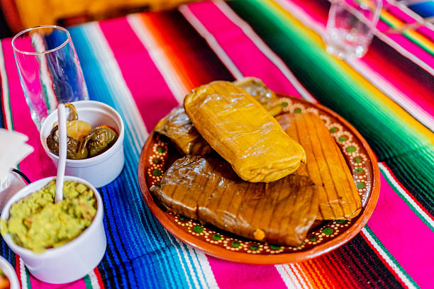 istock Mexican tamale food on table 2245126088