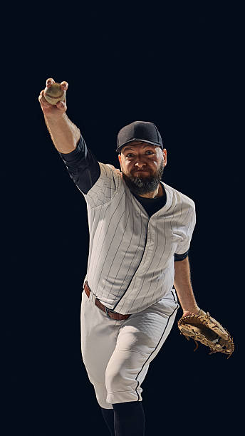 istock Baseball pitcher in full throw showing arm extension and release form 2245128744