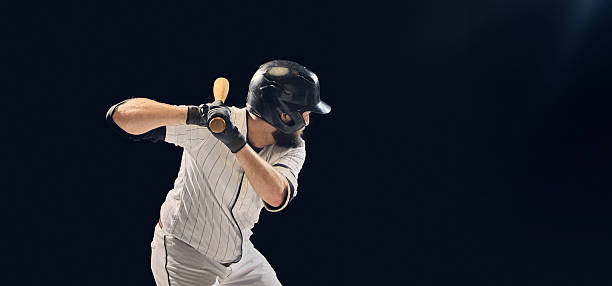 istock Close-up baseball player preparing to hit ball with bat in hands 2245128753