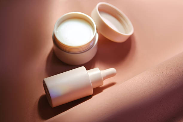 istock Face cream and serum on a soft beige background. 2245130827