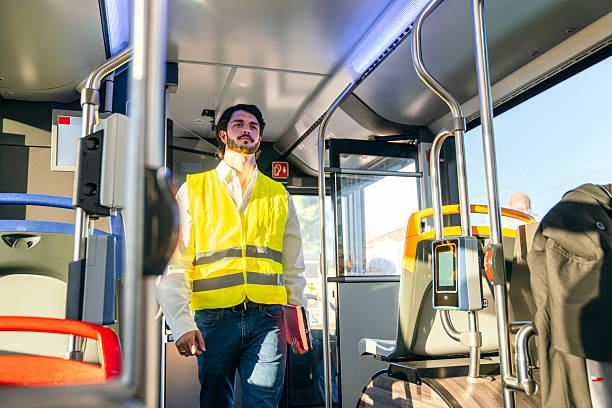 istock Man working in public transport city bus 2245131551