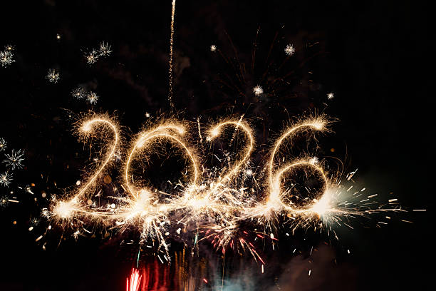 istock Sparkler Happy New Year 2026 with fireworks 2245133132