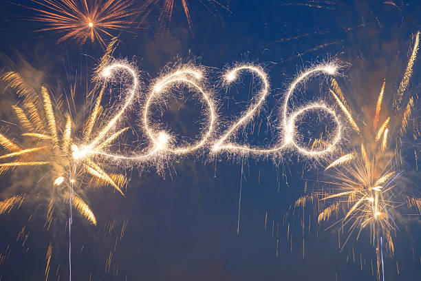 istock Sparkler Happy New Year 2026 with fireworks 2245133543