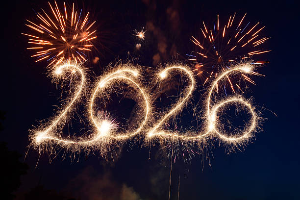 istock Sparkler Happy New Year 2026 with fireworks 2245133730