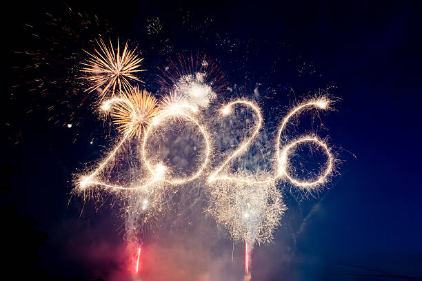 istock Sparkler Happy New Year 2026 with fireworks 2245133871