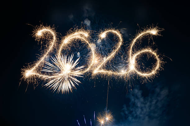 istock Sparkler Happy New Year 2026 with fireworks 2245133896