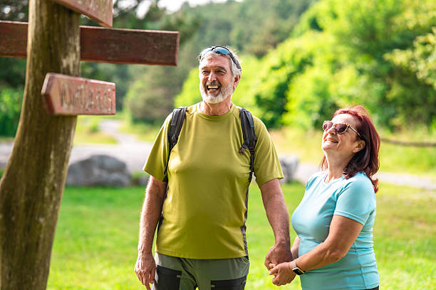 istock Senior Couple Enjoying Hike on Nature Trail 2245134144