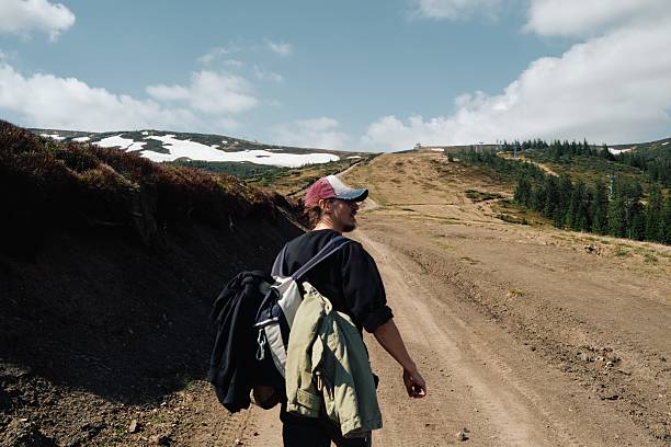 istock Hiker with Backpack on Mountain Trail in Svydovets, Ukraine 2245134354