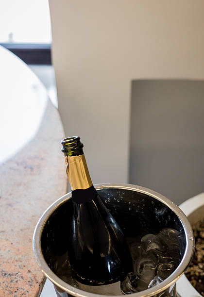 istock Champagne bottle in a bucket with ice. 2245134573